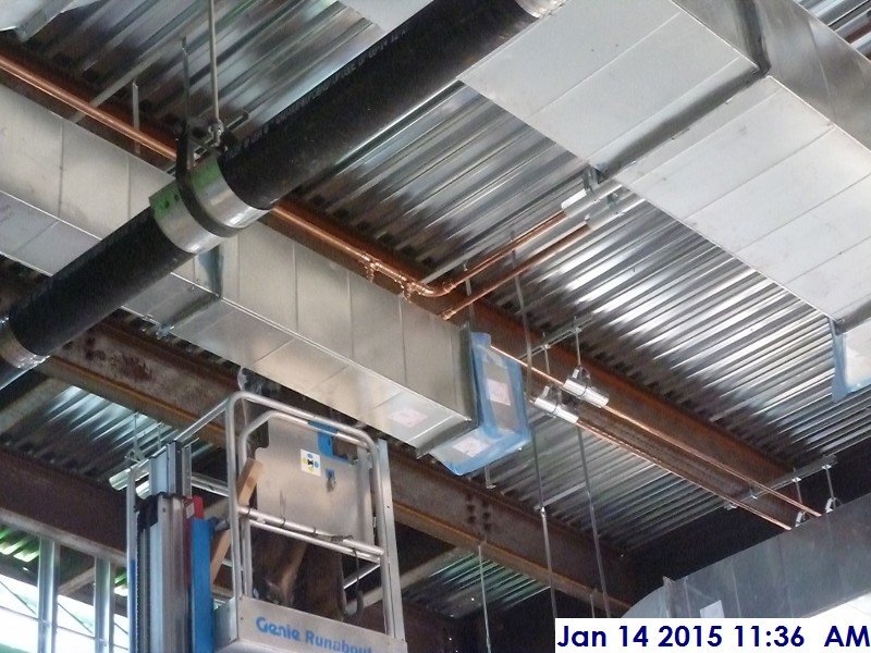 Installing copper piping at the 4th floor Facing North